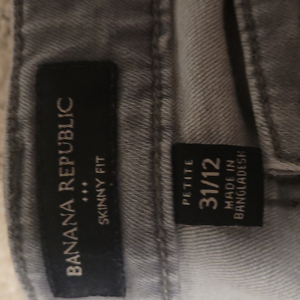 Grey distressed jeans